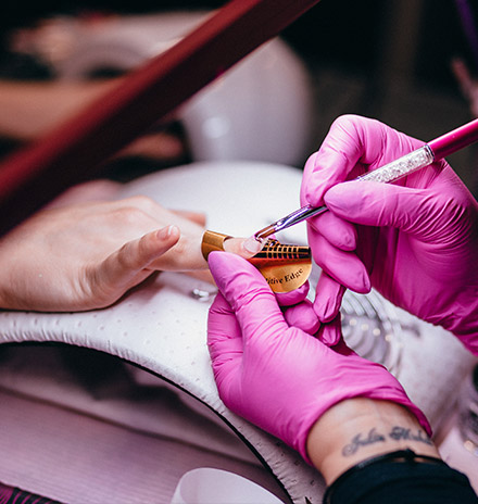 Nail technician at work